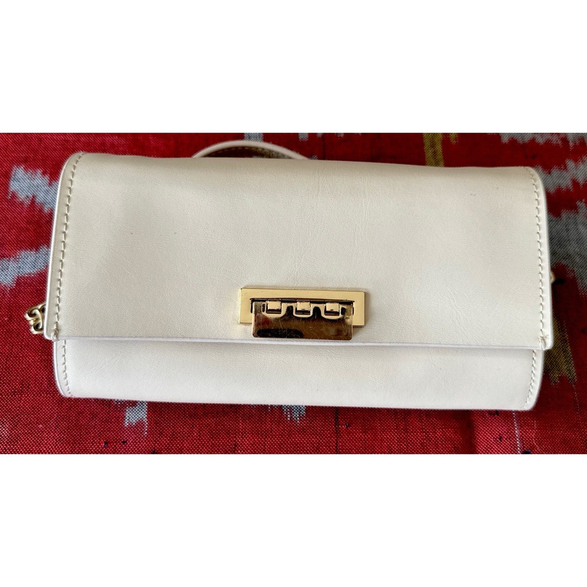 Zac Posen Women’s Leather Small Crossbody Bag in Ivory with detachable strap.
